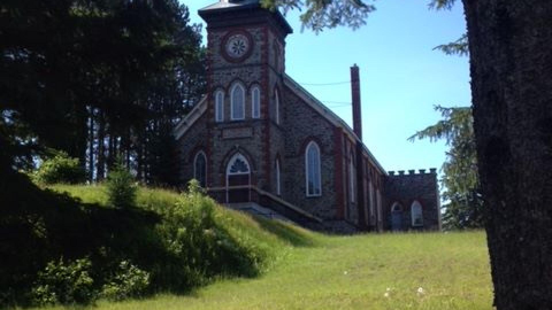 Exterior of St Patrick's Church. The church is situated on top of a hill.